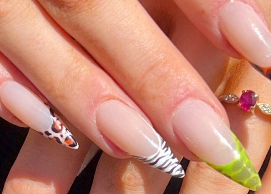 Vibrant nail art at Hasana, Griffith, Australian Capital Territory, AU, showcasing intricate designs.