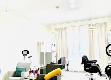 Bright and stylish salon interior at Just A Smile Salon, Doha, Doha Municipality, QA, featuring modern furnishings.