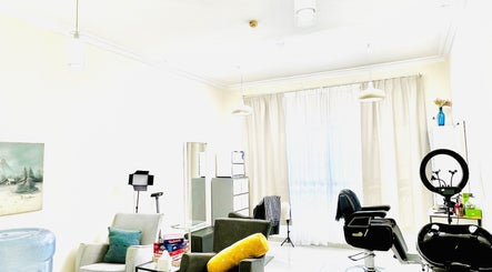 Bright and stylish salon interior at Just A Smile Salon, Doha, Doha Municipality, QA, featuring modern furnishings.