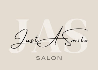 Sophisticated logo of Just A Smile Salon, located in Doha, Doha Municipality, QA, exuding elegance and charm.