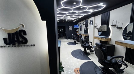 Chic interior of Just A Smile Salon in Doha, Doha Municipality, QA showcasing modern styling chairs and mirrors.