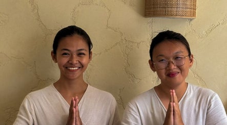 Smiling staff offering a warm greeting at Face Therapy Spa, Umalas, Bali, ID.