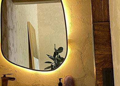 Luxurious illuminated mirror at Face Therapy Spa, Umalas in Bali, ID showcasing a serene ambiance.
