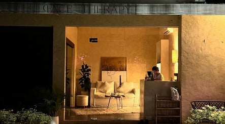 Cozy interior of Face Therapy Spa, Umalas, Bali, ID with warm lighting and comfortable seating.