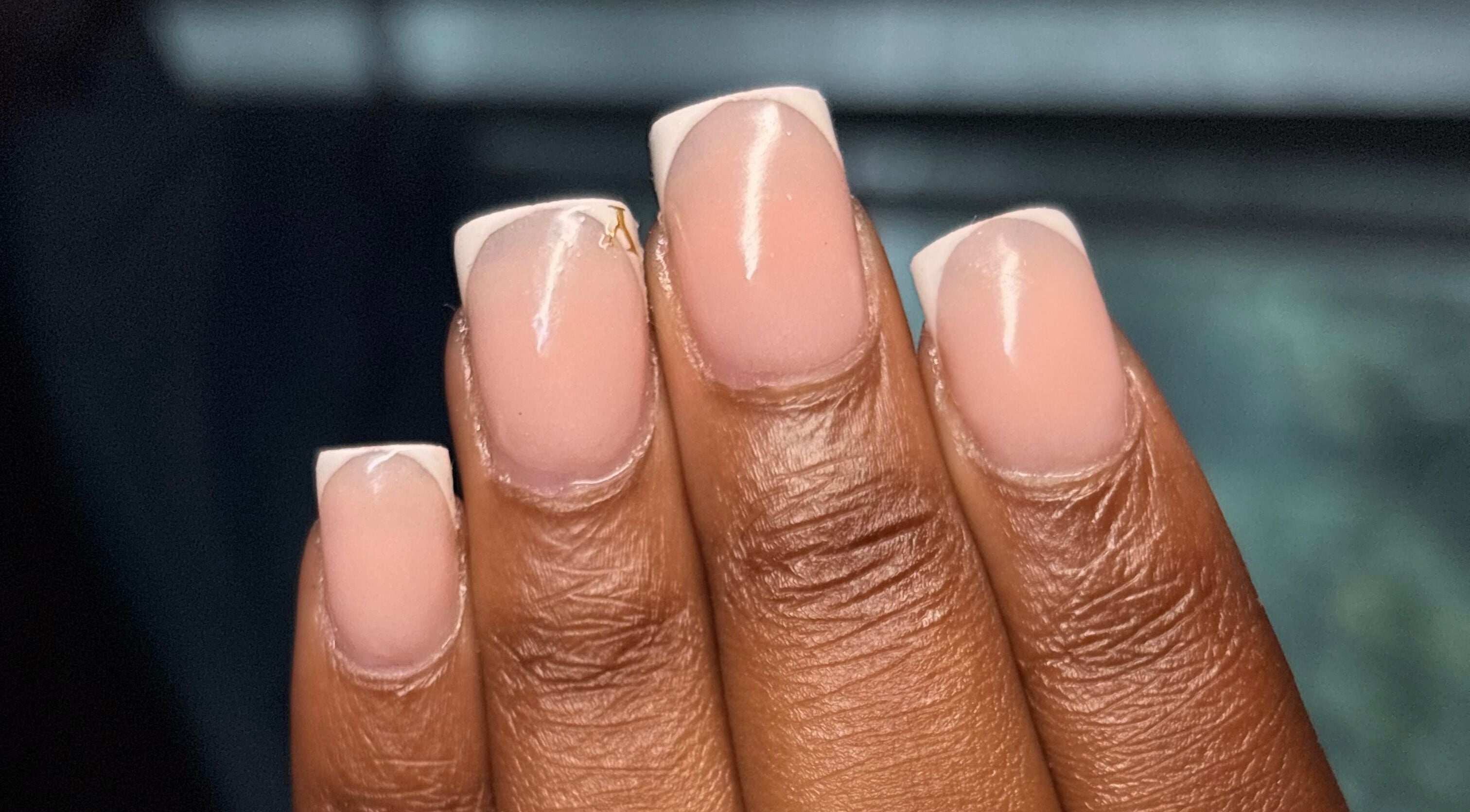 Elegant French manicure at Thee Adore Beauty Bar, London, England, GB. Showcase perfect nail styling.