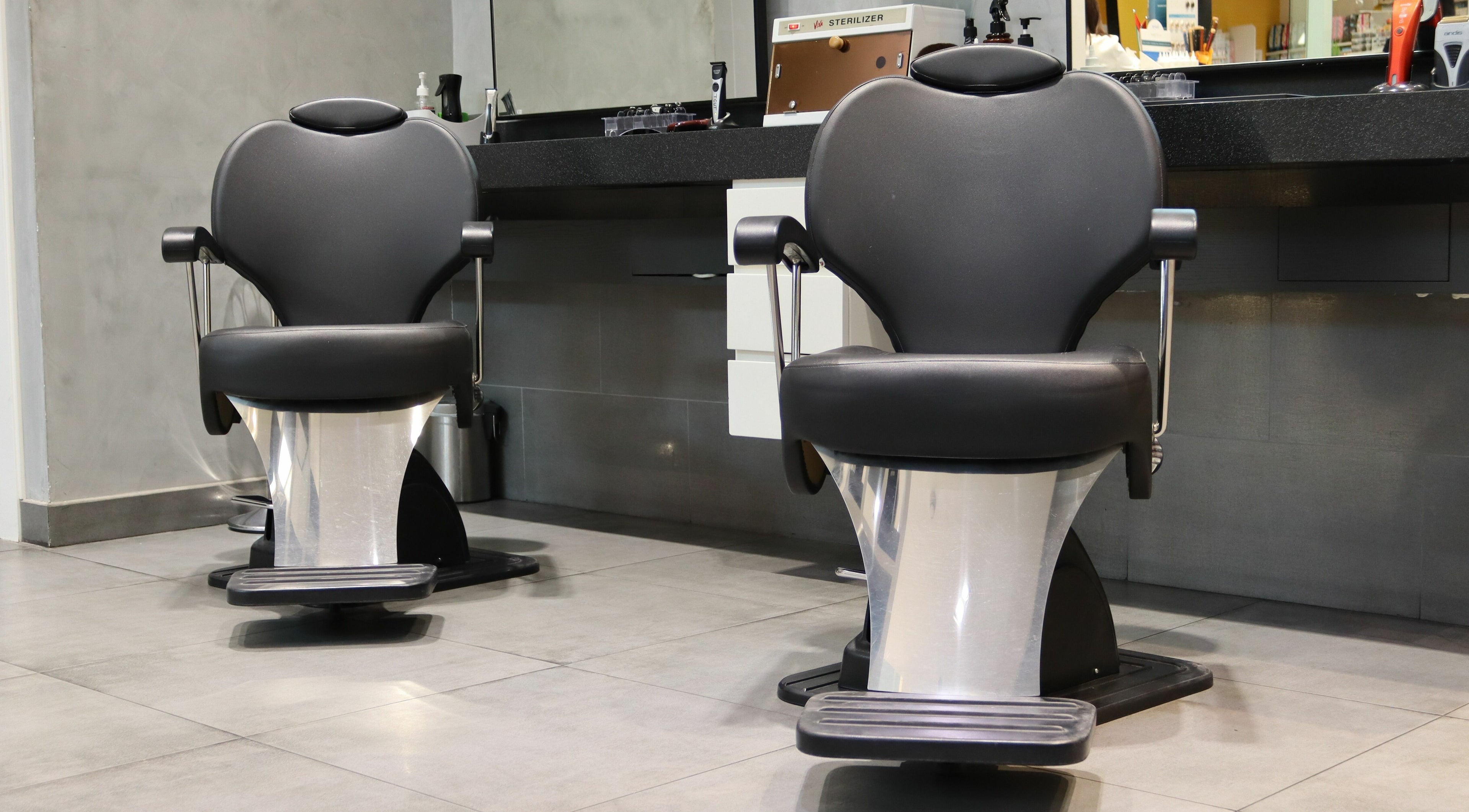 Modern salon chairs at Mariani Gents Salon, Dubai, Dubai, AE offering premium barber services.