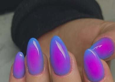 Stylish ombre nails at Thee Nail Plugk, Cape Town, Western Cape, ZA, offering vibrant beauty solutions.