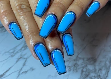 Bold blue nail art at Thee Nail Plugk in Cape Town, Western Cape, ZA showcasing creative manicure style.