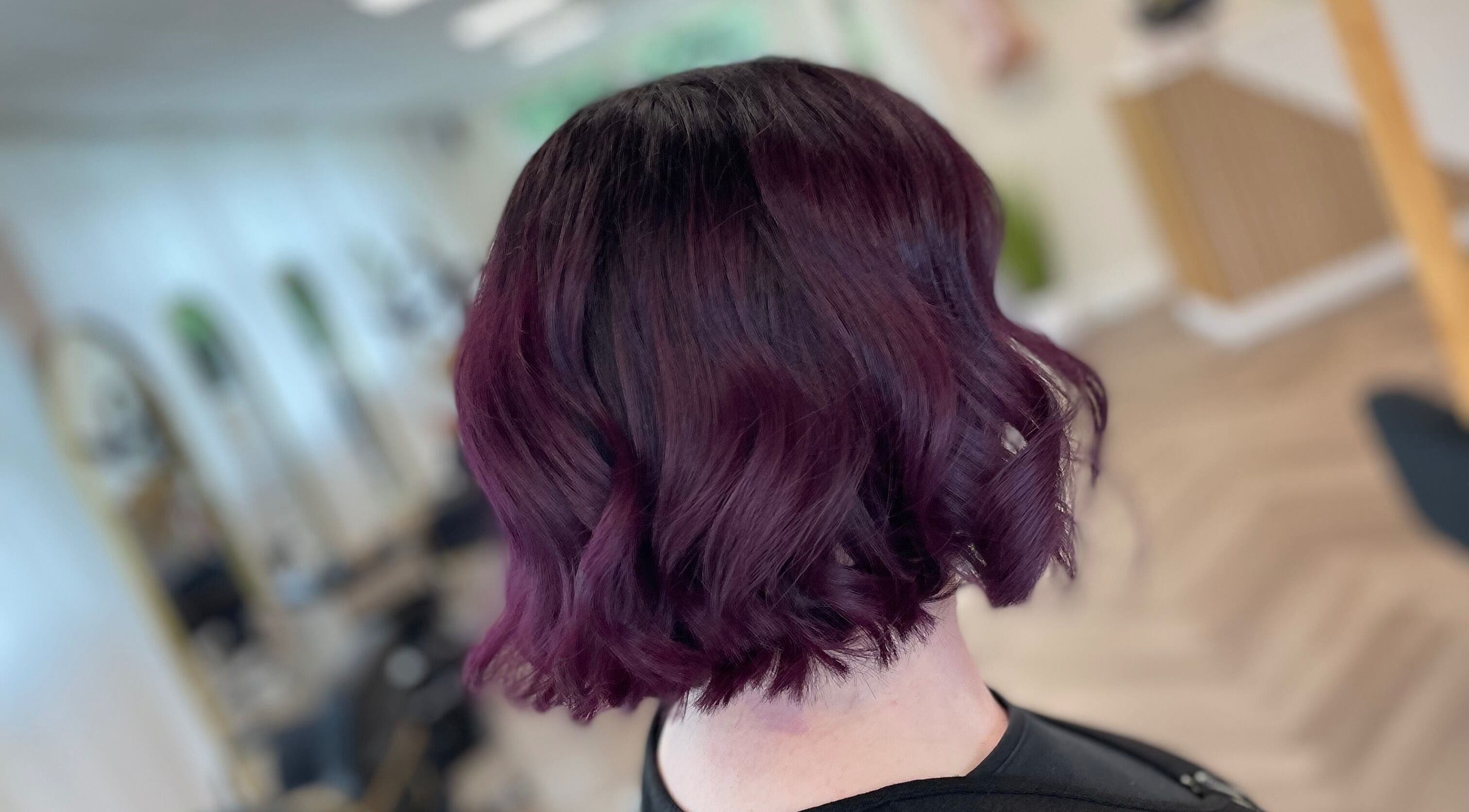 Chic plum bob hairstyle at Alice Tobin Hair Design, Cardiff, Wales, GB showcasing vibrant coloration.