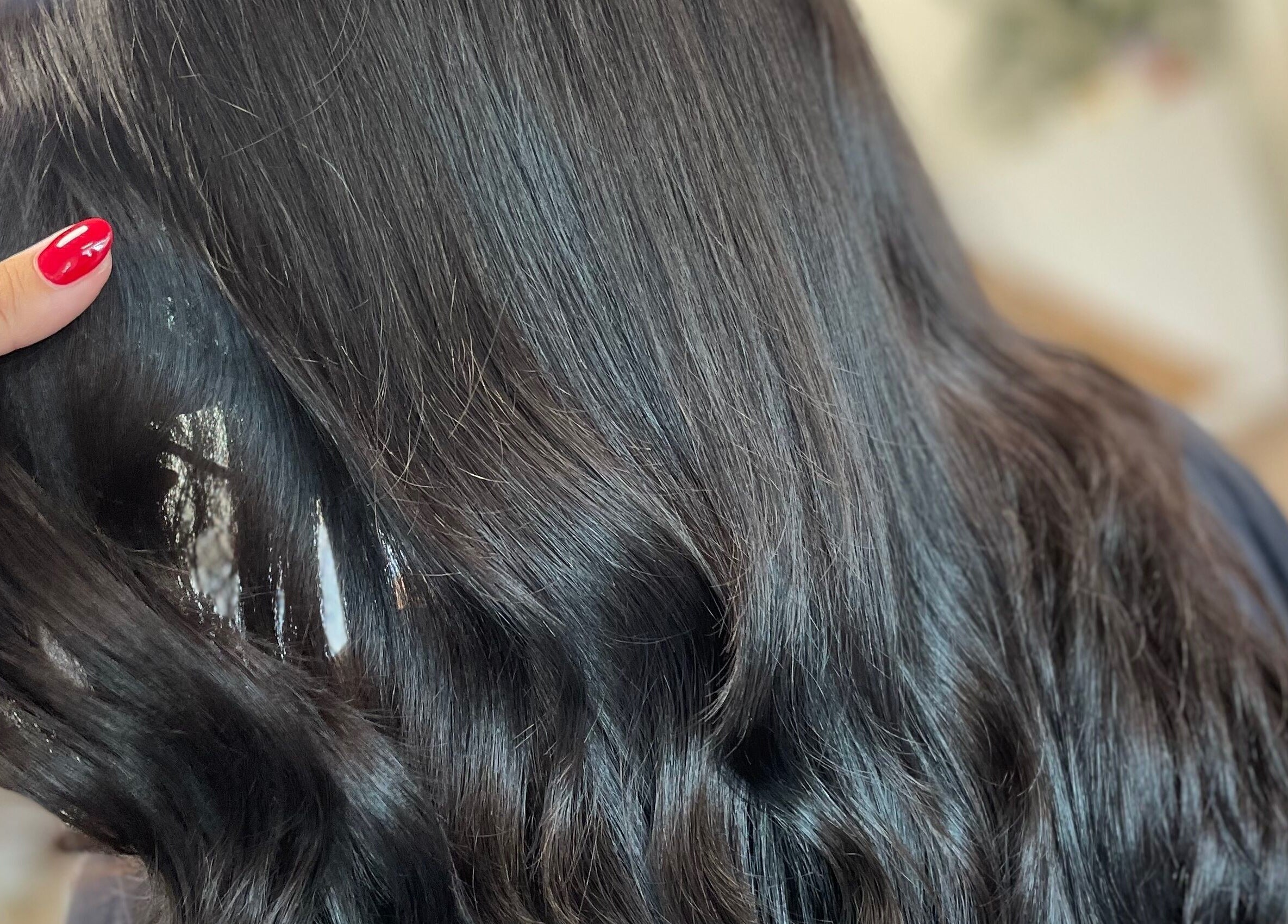 Shiny, styled hair at Alice Tobin Hair Design, Cardiff, Wales, GB, showcasing professional hair care services.