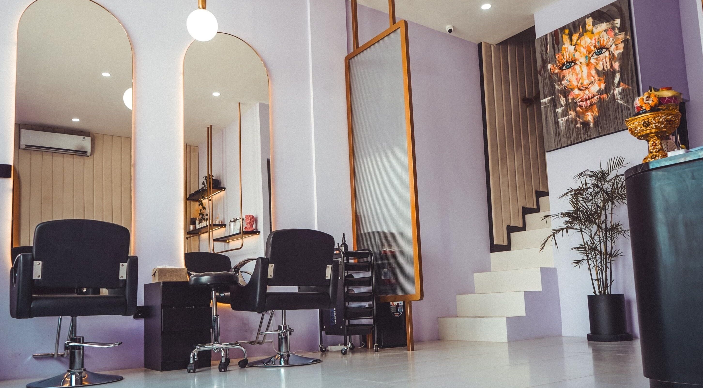 Modern salon interior at Opulent Hair and Beauty in Bali, Bali, ID, featuring stylish chairs and decor.