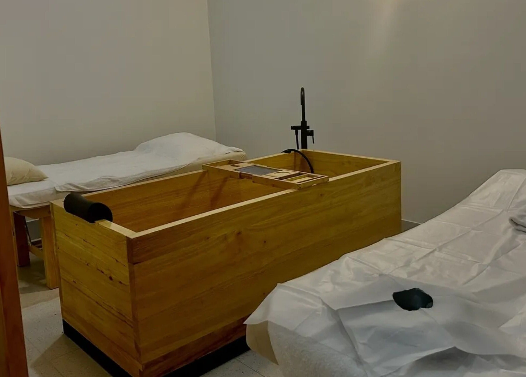 Relaxing spa room with massage tables at Mada Sora Spa, Rural View, Queensland, AU.