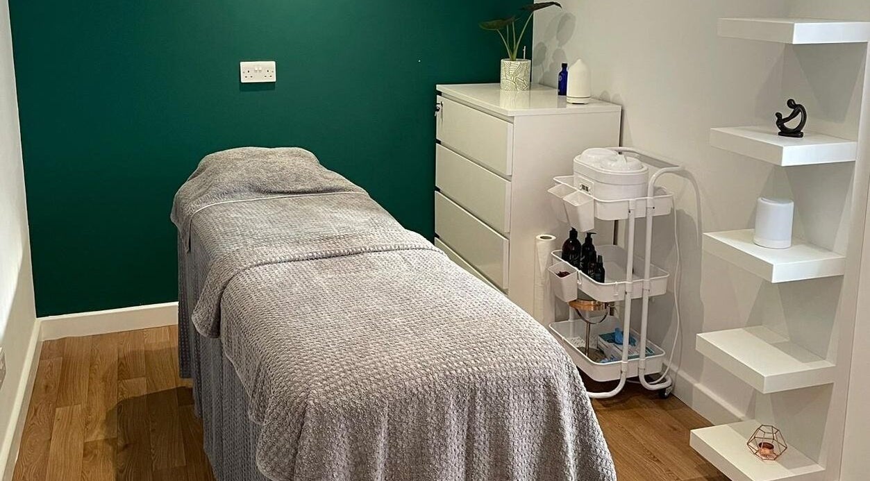 Relaxing treatment room at The Secret Beauty Garden, Nottingham, United Kingdom, GB, featuring a serene spa bed.