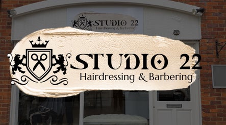 Front view of Studio 22 Hairdressing in Stony Stratford, England, GB with stylish logo displayed.