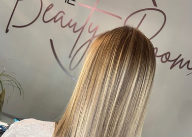 Elegant hairstyle at The Beauty Room (Heads Up Hair) by Mariska, Pretoria, Gauteng, ZA, showcasing long, sleek hair.