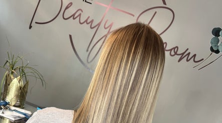 Elegant hairstyle at The Beauty Room (Heads Up Hair) by Mariska, Pretoria, Gauteng, ZA, showcasing long, sleek hair.