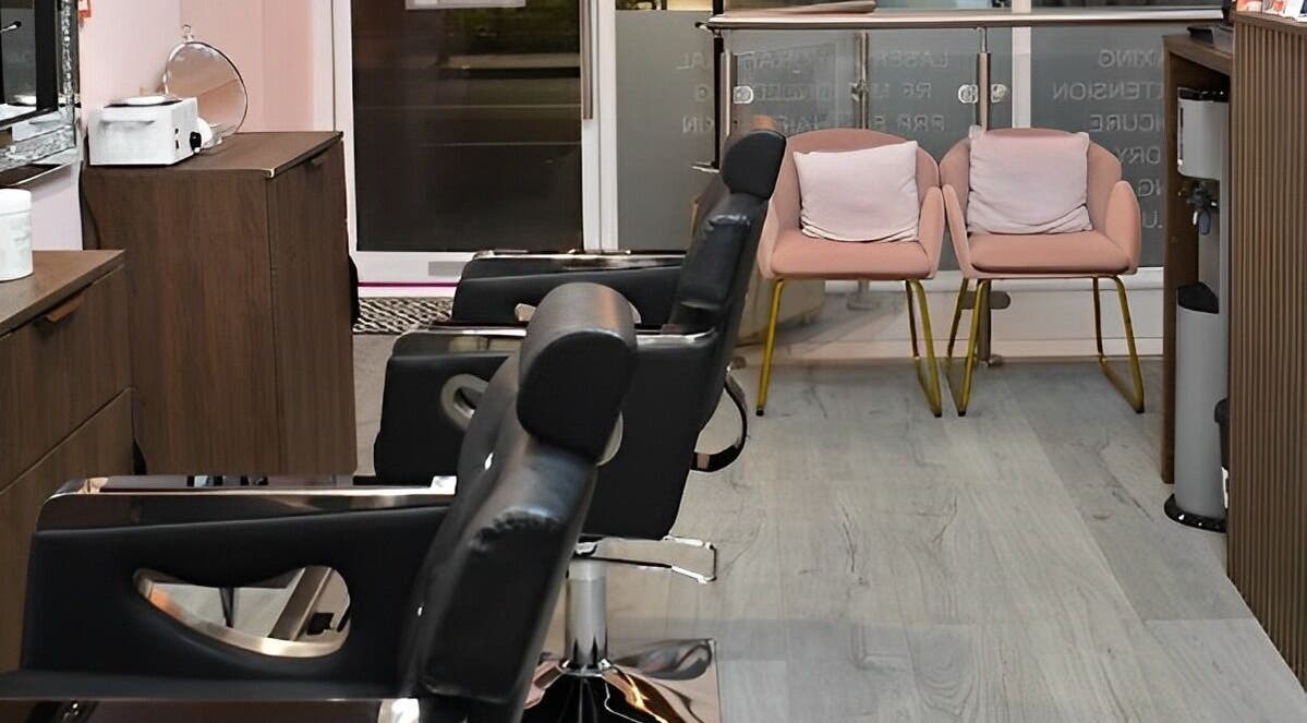 Chic salon chairs and waiting area at Patel Sisters Aesthetic Beauty Clinic in London, England, GB.