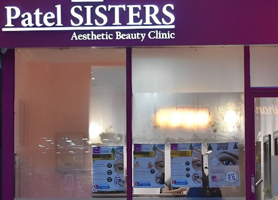 Front view of Patel Sisters Aesthetic Beauty Clinic in London, England, GB with vibrant signage and window display.