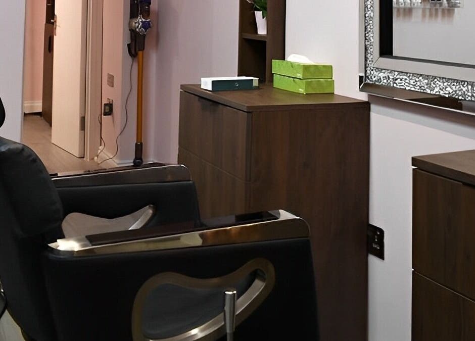 Elegant salon chair at Patel Sisters Aesthetic Beauty Clinic, London, England, GB. Modern and inviting interior.