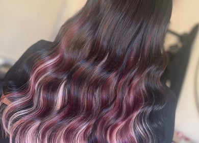 Vibrantly colored wavy hair styled at Luxury Locks by Steph in Altofts, England, GB.