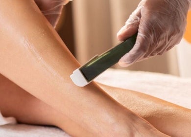 Professional leg waxing at The Waxing Room, Pencoed, Wales, GB, ensuring smooth skin care.