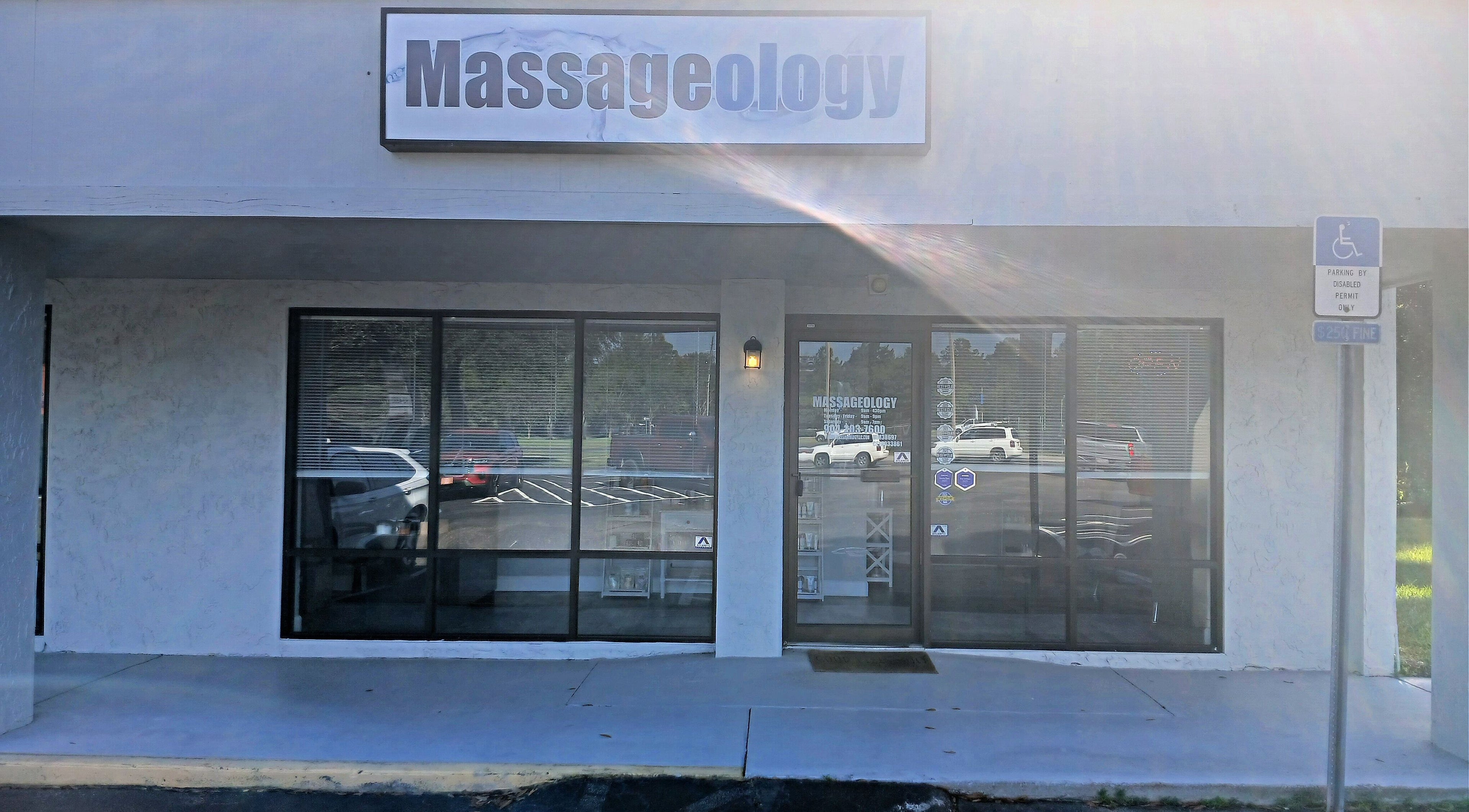 Front entrance of Massageology, Middleburg, Florida, US, showing a welcoming storefront.