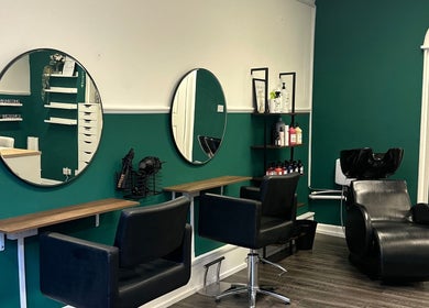 Modern salon chairs and mirrors at Hope Webley Hairdressing, Perth, Scotland, GB, styled with elegance.