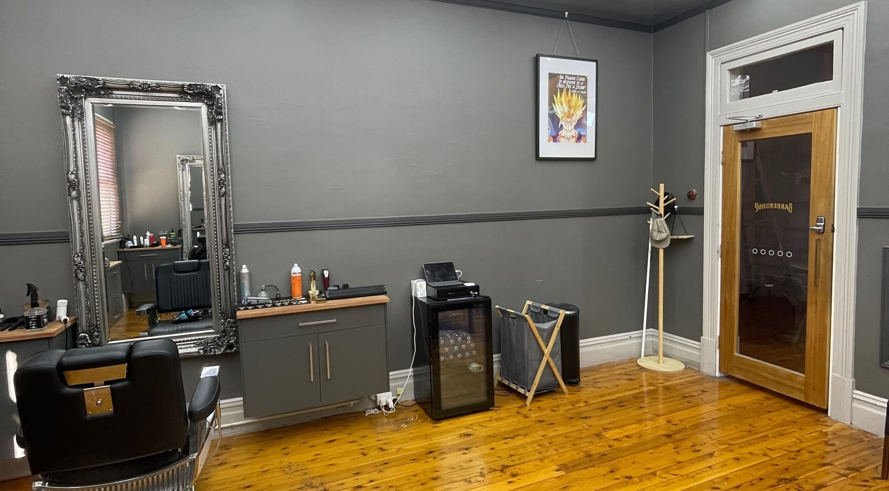 Elegant interior of Kingdom Barbers & Co. in Tamworth, New South Wales. Classic styling chair and mirror.