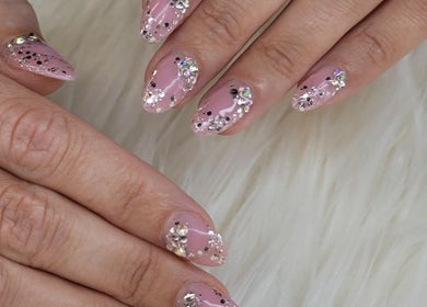 Close-up of glittery nail art at Solis Vita Spa.Michelle, St. Thomas, Ontario, CA.