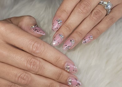 Elegant nail art featuring glittery nails at Solis Vita Spa.Michelle, St. Thomas, Ontario, CA.