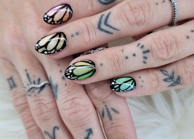 Intricate butterfly nail art at Solis Vita Spa.Michelle, St. Thomas, Ontario, CA. A nail masterpiece.