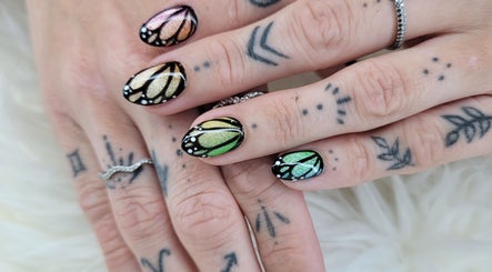 Intricate butterfly nail art at Solis Vita Spa.Michelle, St. Thomas, Ontario, CA. A nail masterpiece.