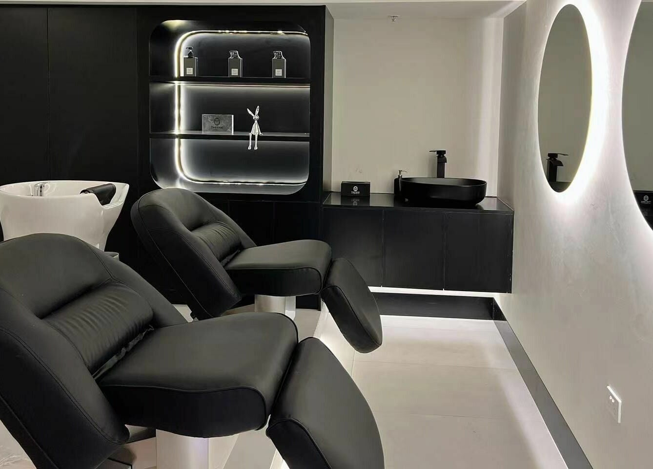 Luxurious spa chairs at The One Skin Lab - QVB, Sydney, New South Wales, AU, offering premium wellness services.