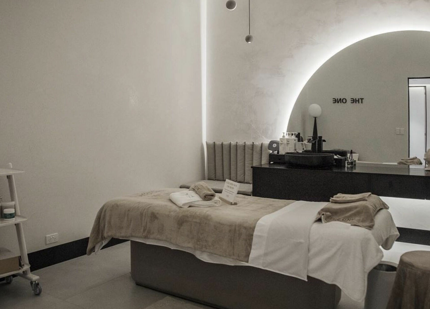 Elegant treatment room at The One Skin Lab - QVB in Sydney, New South Wales, AU offering tranquil wellness.