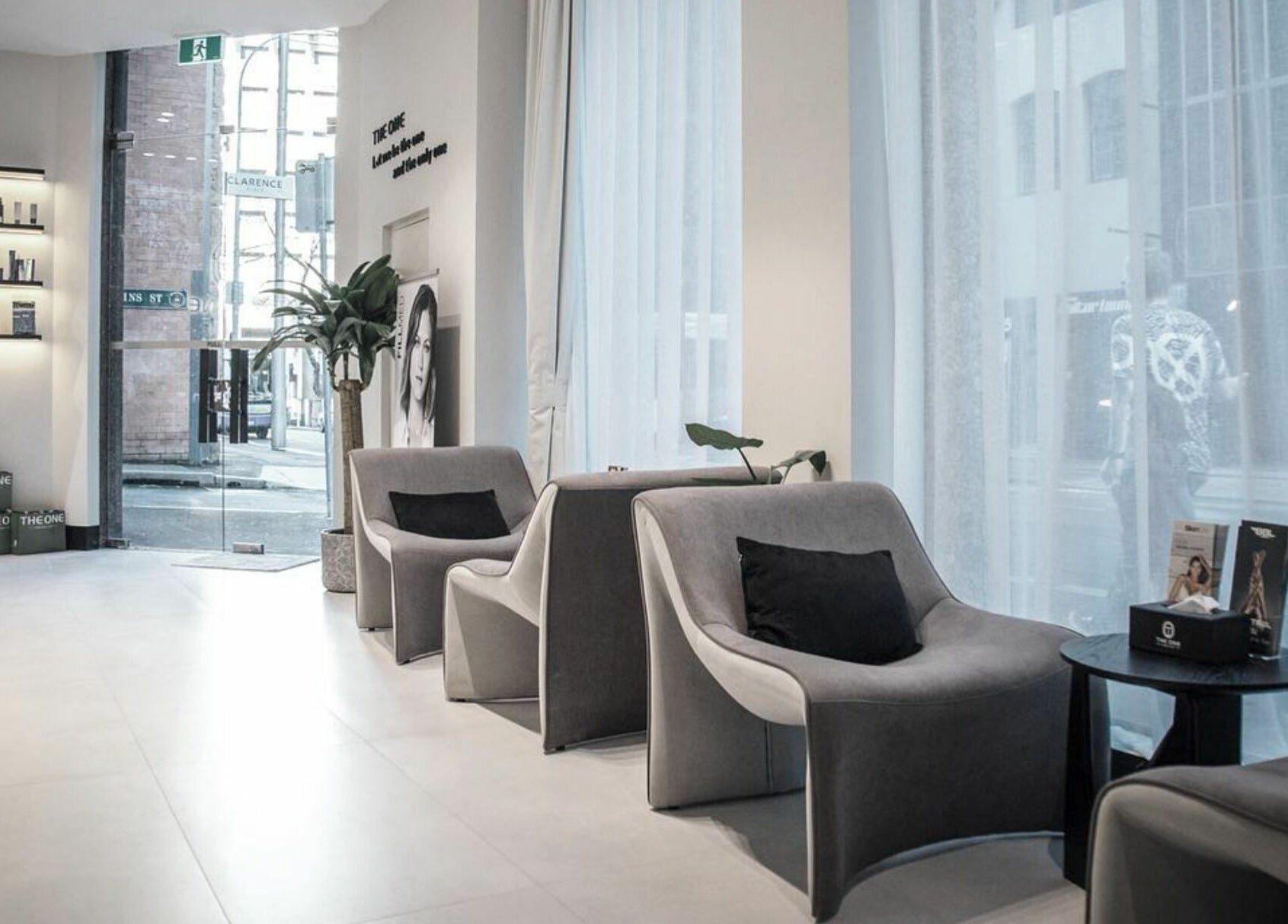 Sophisticated waiting area at The One Skin Lab - QVB, Sydney, New South Wales, AU with modern decor.