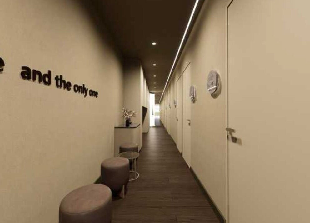 Elegant hallway at The One Skin Lab - Parramatta, showcasing modern design in Parramatta, New South Wales, AU.