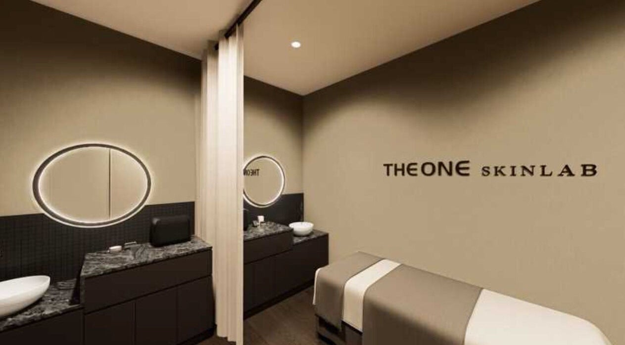 Elegant spa room at The One Skin Lab - Parramatta, New South Wales, AU with modern decor and soft lighting.