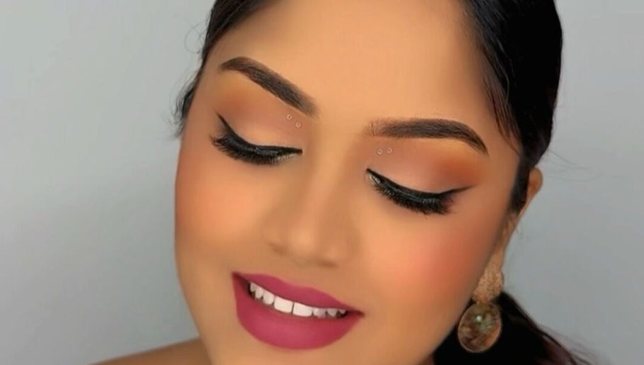 Elegant makeup look at Rana Beauty Room, San Juan, San Juan-laventille Regional Corporation, TT with vibrant lipstick.