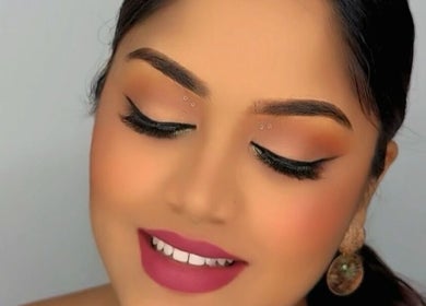 Elegant makeup look at Rana Beauty Room, San Juan, San Juan-laventille Regional Corporation, TT with vibrant lipstick.