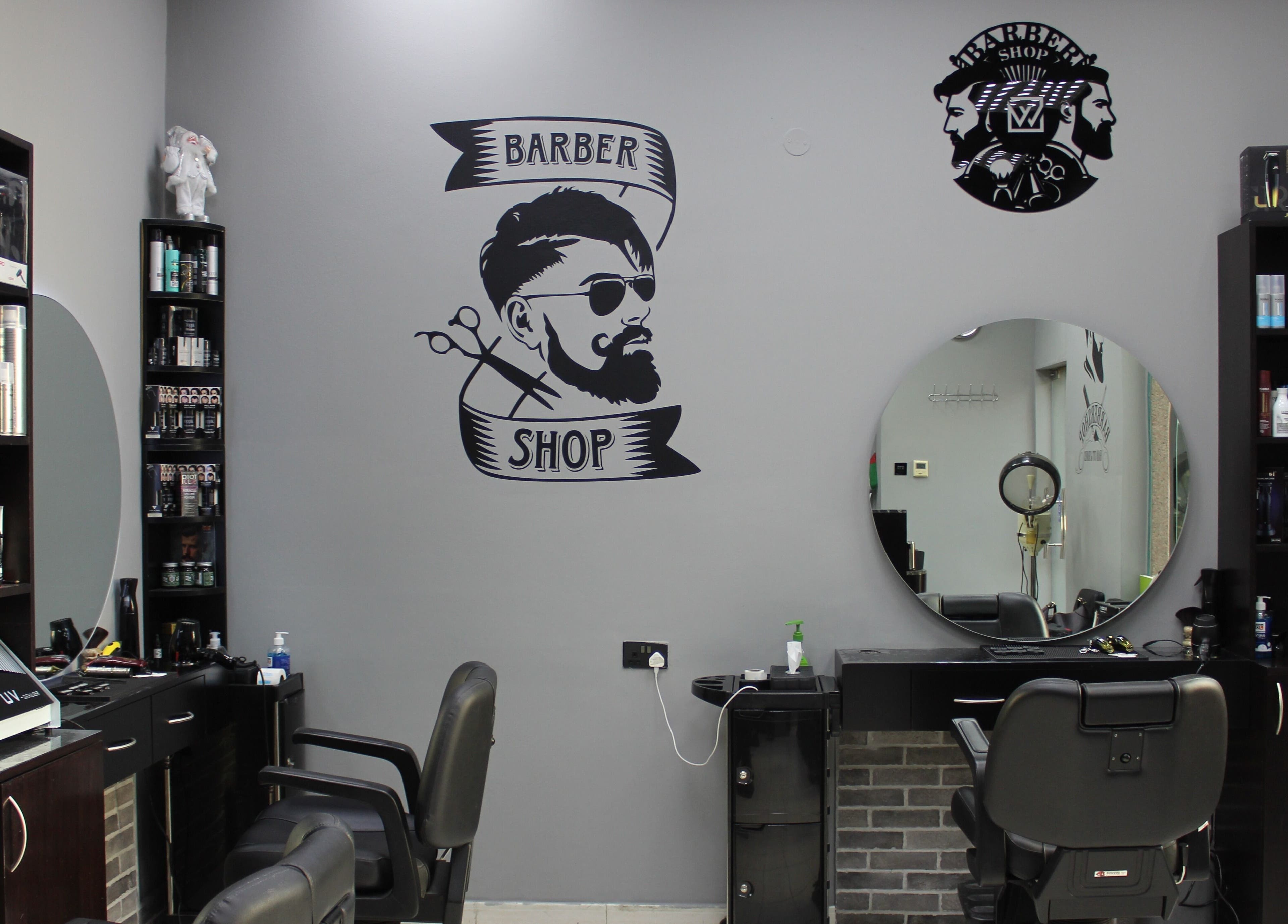 Interior of White Tower Salon صالون البرج الأبيض - Sheikh Zayed Road showcasing barber chairs and products, Dubai, Dubai, AE.