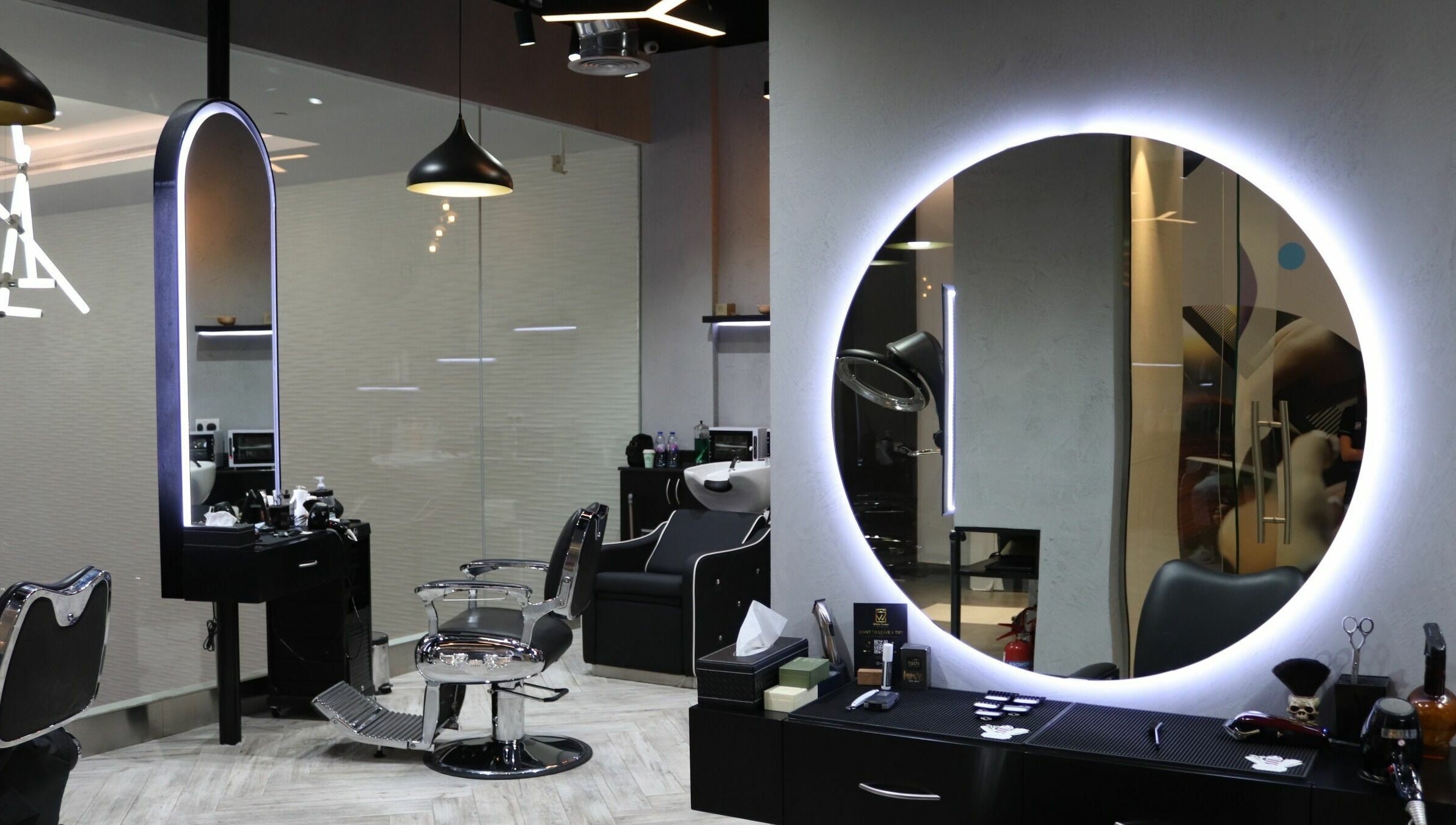 Modern salon at White Tower Salon صالون البرج الأبيض - Digital Park, Dubai, AE, featuring stylish decor.