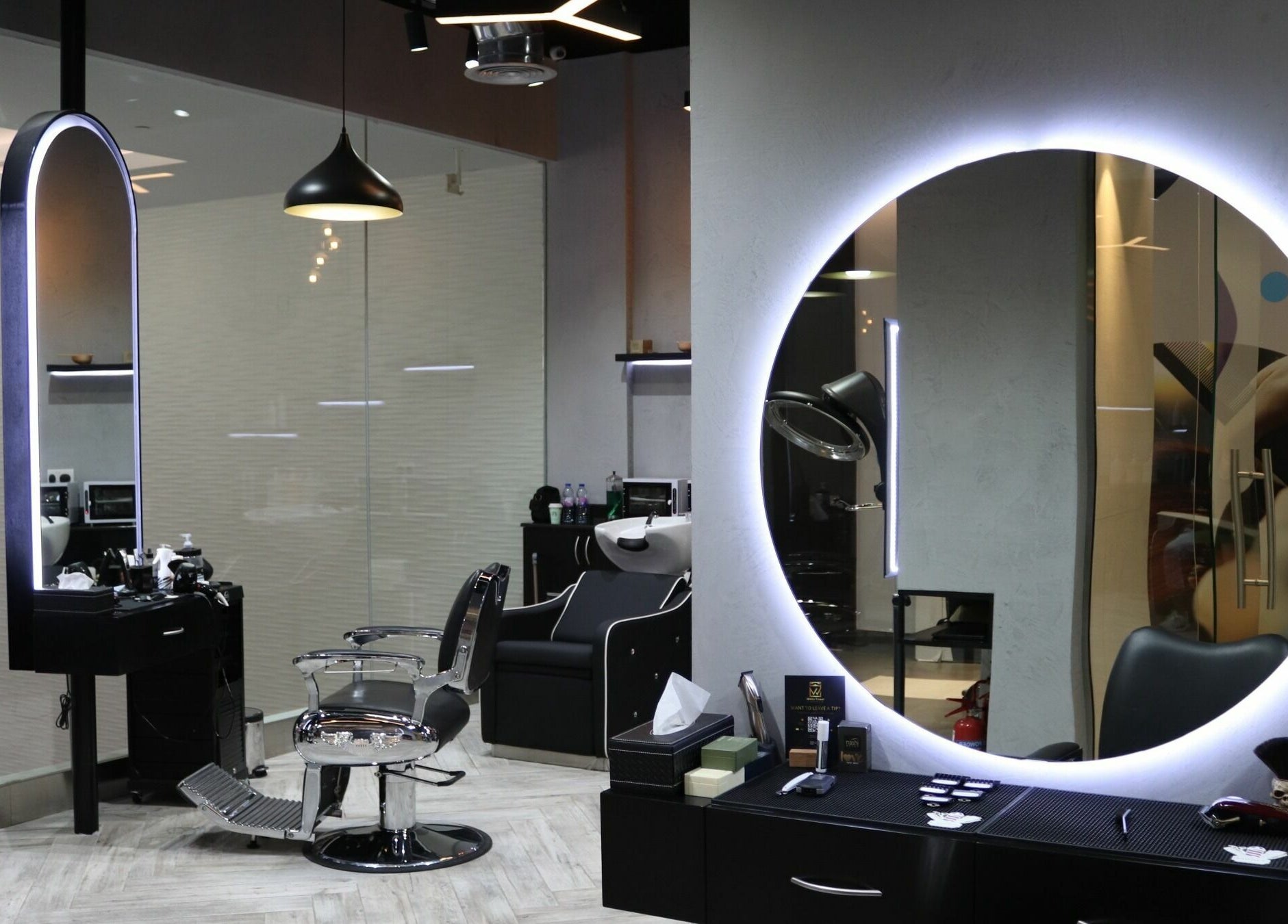 Modern salon at White Tower Salon صالون البرج الأبيض - Digital Park, Dubai, AE, featuring stylish decor.
