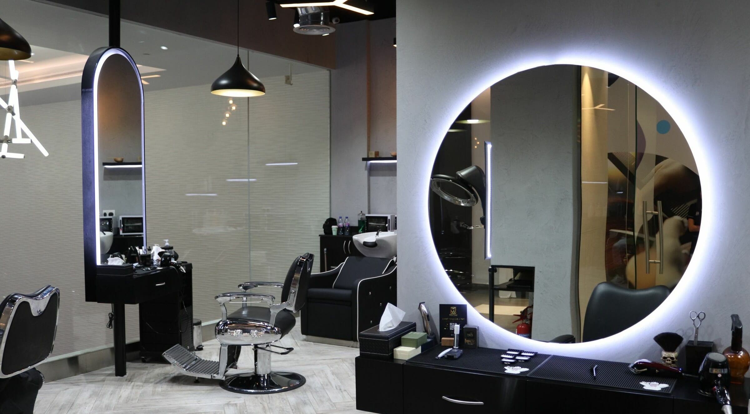 Modern salon at White Tower Salon صالون البرج الأبيض - Digital Park, Dubai, AE, featuring stylish decor.