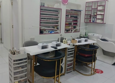 Nail service area at Jamal Rosalina Ladies Salon, Dubai, Dubai, AE with chairs and manicure tools.
