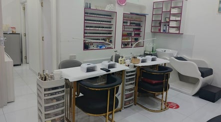 Nail service area at Jamal Rosalina Ladies Salon, Dubai, Dubai, AE with chairs and manicure tools.