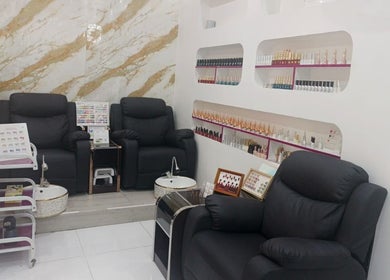 Elegant nail salon seating area at Jamal Rosalina Ladies Salon, Dubai, Dubai, AE, showcasing stylish nail products.
