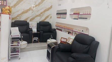 Elegant nail salon seating area at Jamal Rosalina Ladies Salon, Dubai, Dubai, AE, showcasing stylish nail products.