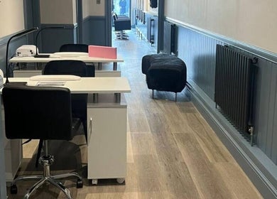 Modern workspace at The Milano Hair & Beauty Suite, Larkhall, Scotland, GB, showcasing sleek design and comfort.