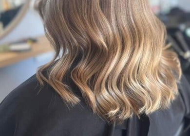 Elegant wavy hairstyle at Zo's Hidden Hair & Beauty in Ranelagh, Tasmania, AU, enhancing beauty.