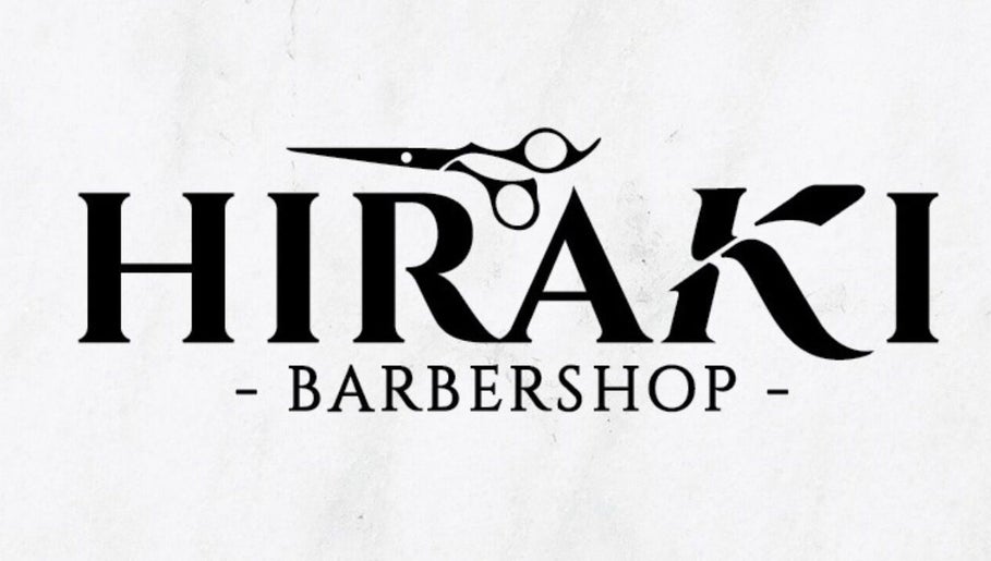 Elegant Hiraki Barbershop logo in Rawang, Selangor, MY showcasing scissors.